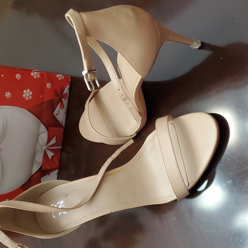 Shoes white and tan new in box an slightly worn tan like new